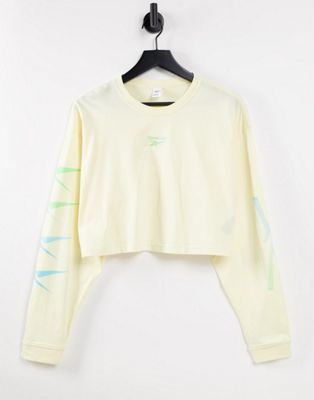 Reebok long sleeve top in yellow with vector arm detail