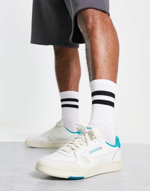 Reebok LT Court sneakers in white and blue