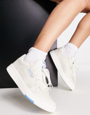 Reebok LT Court trainers in cream and blue