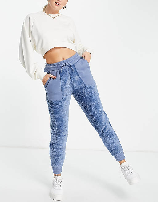 Women Reebok MYT cozy joggers with pockets in blue borg 