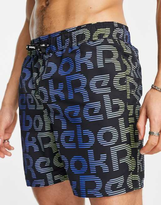 Reebok Pantaloncini da bagno neri blu e gialli con stampa del logo ASOS