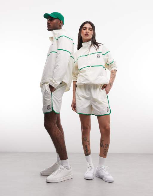 Reebok - Conjunto blanco hueso de pantalones cortos de 4" y chaqueta cortavientos de tejido liso, 3 de 3