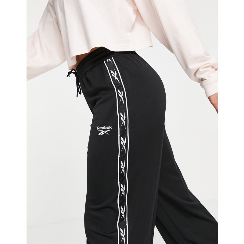 Pantaloni con fondo ampio Pantaloni e leggings Reebok - Pantaloni a fondo ampio neri con logo