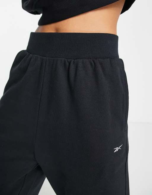 Reebok Pantaloni a vita alta con fondo ampio neri ASOS