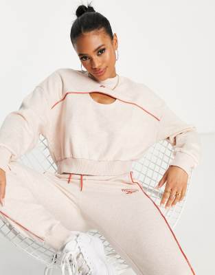 Reebok piping sweatshirt with cut out detail in pale pink - ASOS Price Checker
