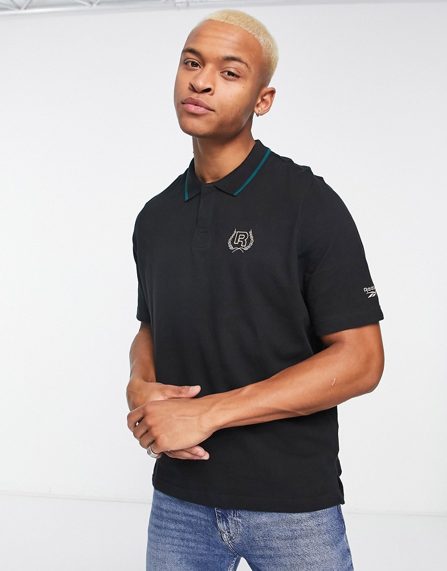 Reebok reserve short sleeve polo shirt in black