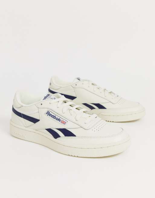 Reebok revenge plus trainers in off white with cheap navy stripe