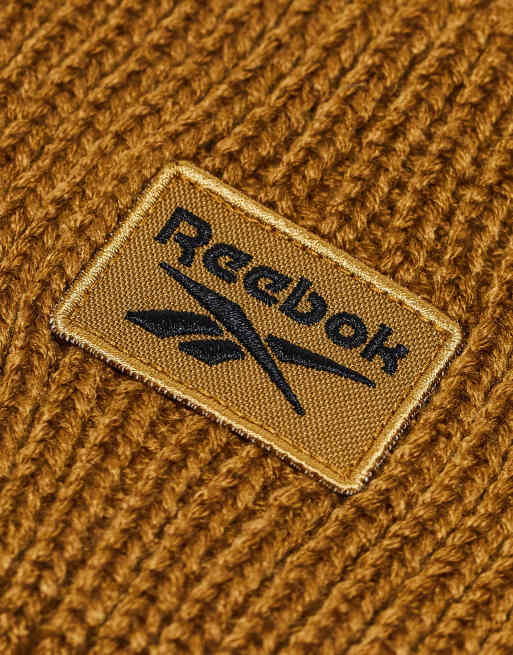 Reebok ribbed logo beanie in mustard brown | ASOS