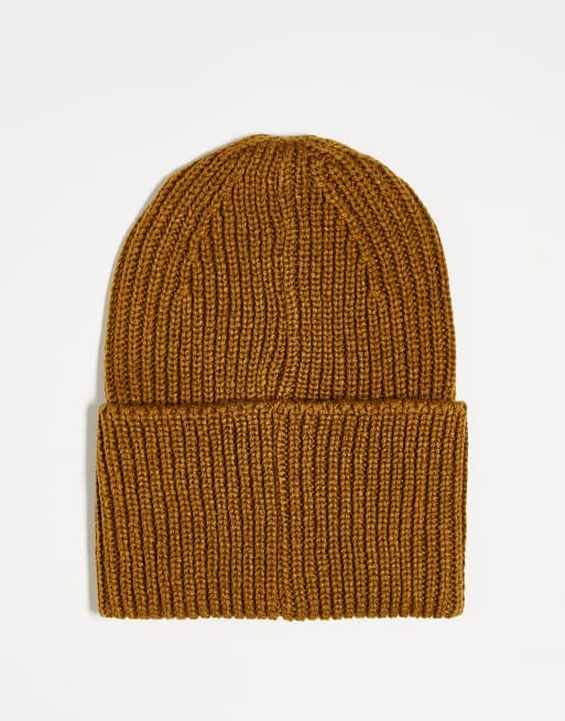 Reebok ribbed logo beanie in mustard brown | ASOS