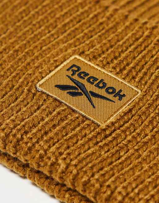 Reebok ribbed logo beanie in mustard brown | ASOS