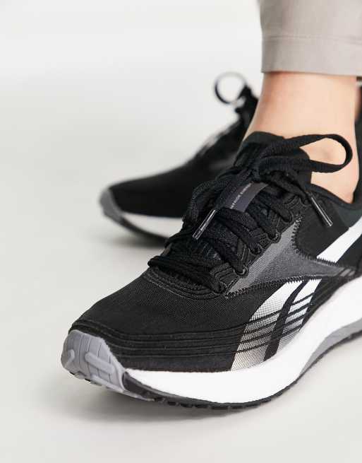 Running Floatride 4 trainers black and white ASOS