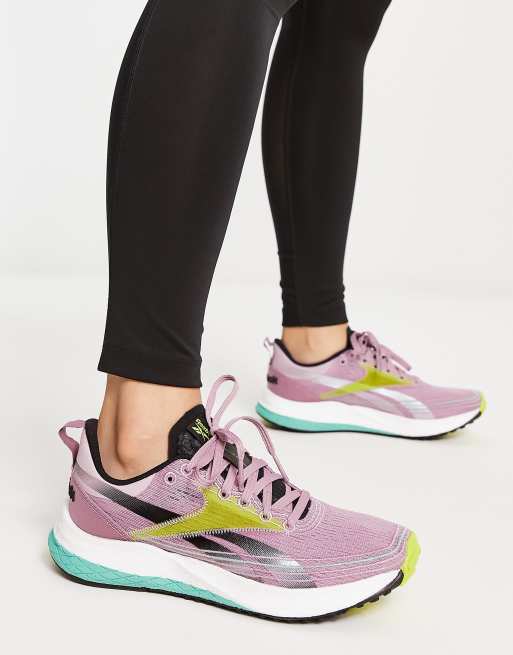 Pink reebok store running shoes