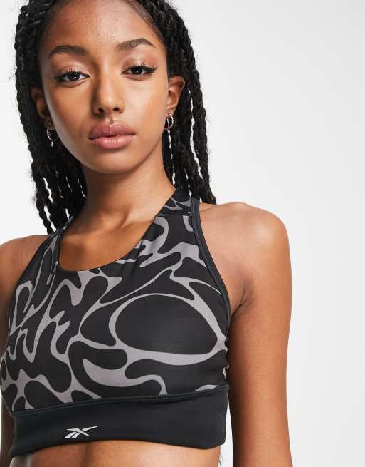 Reebok Running marbled print high-support sports bra in black