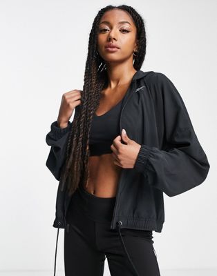 Reebok Running woven cropped full zip jacket in black