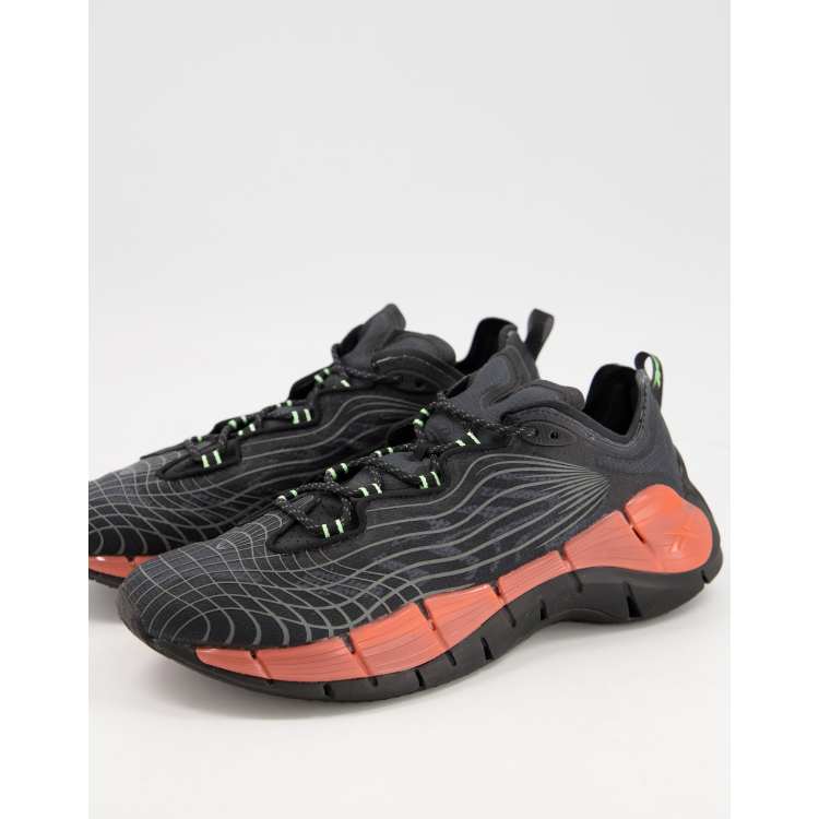 Reebok Running Zig Kinetica II sneakers in black and orange