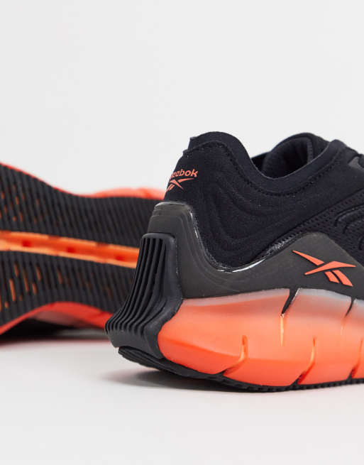 Reebok black and on sale orange