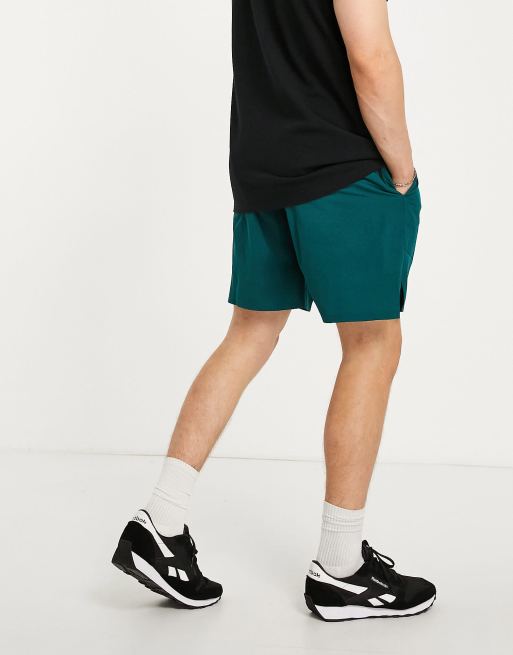 Reebok shorts with contrast waist in dark green ASOS