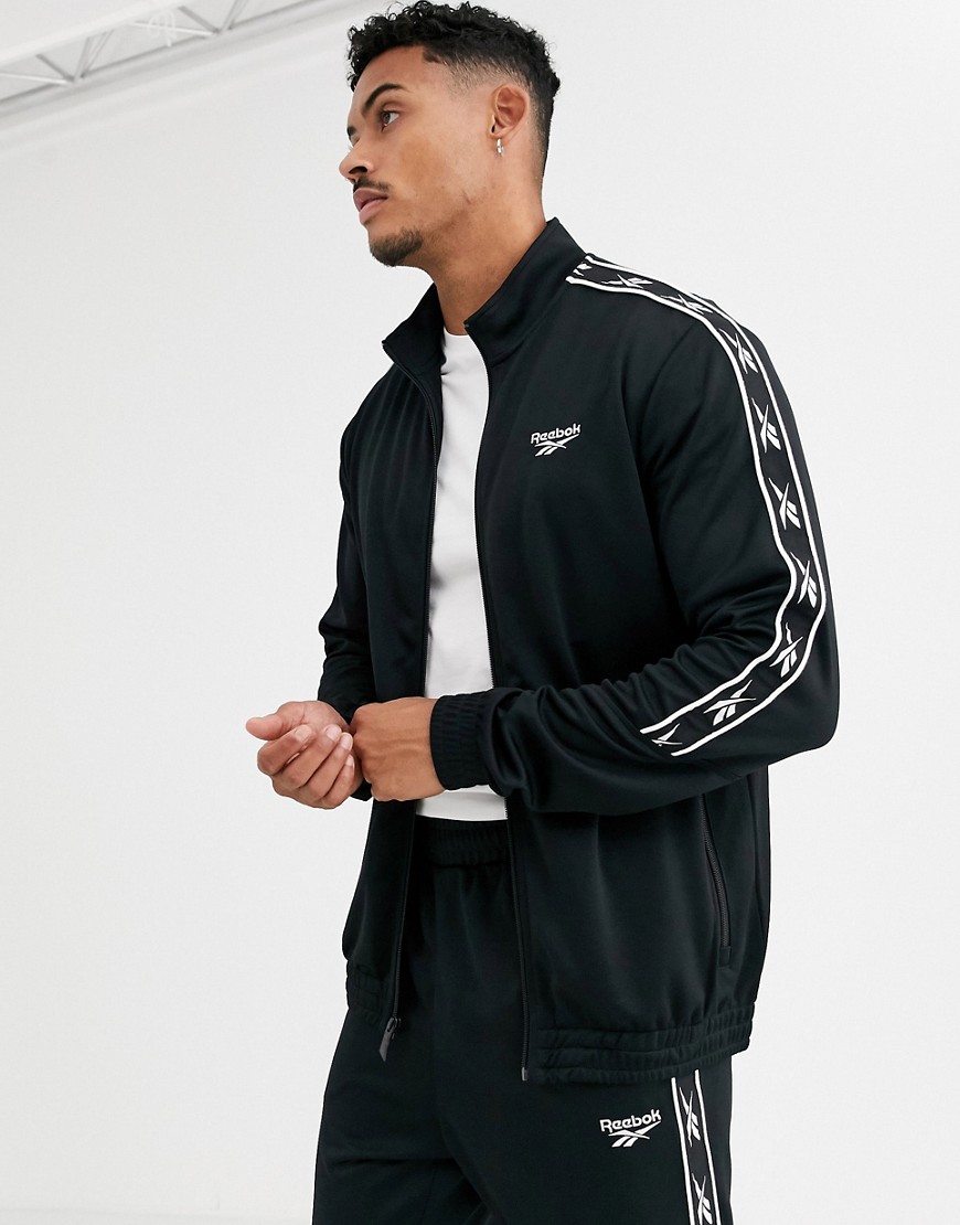 Reebok track jacket with logo taping in black
