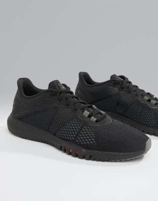 reebok training astroride flex trainers in triple black cn2586