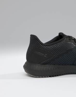 reebok training astroride flex trainers in triple black cn2586