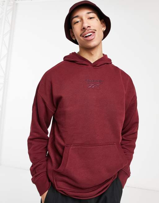 Reebok Training Essentials hoodie in red melange | ASOS