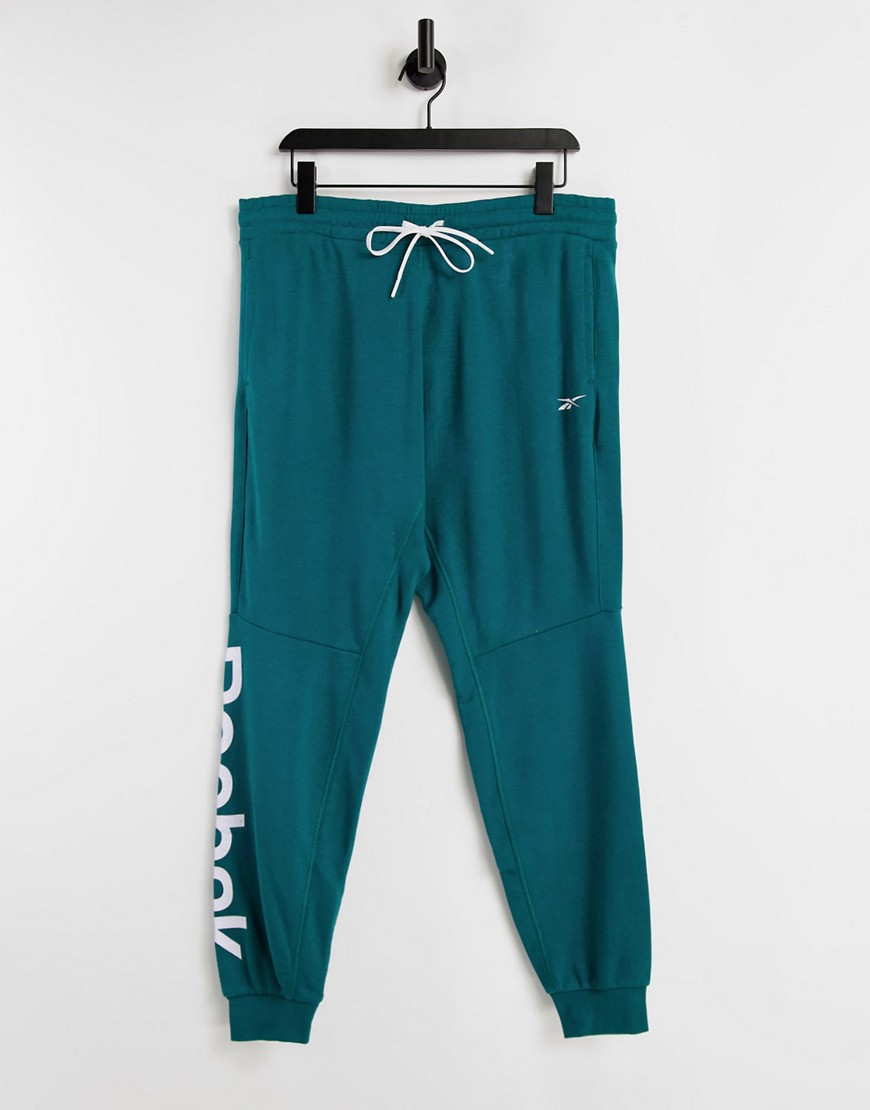 Reebok Training Essentials linear logo sweatpants in turquoise-Green
