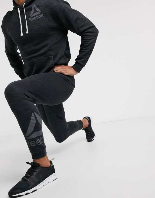 Reebok training essentials store marble pants