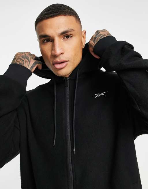Reebok Training Felpa con cappuccio in pile nera con zip e logo