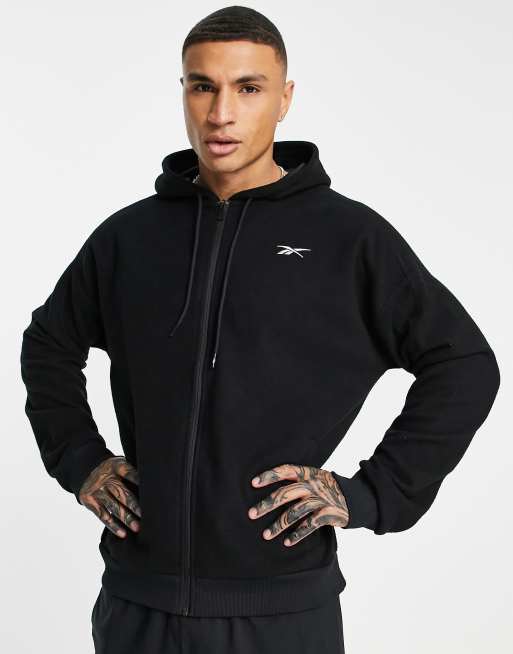 Reebok Training fleece zip thru hoodie with logo in black | ASOS