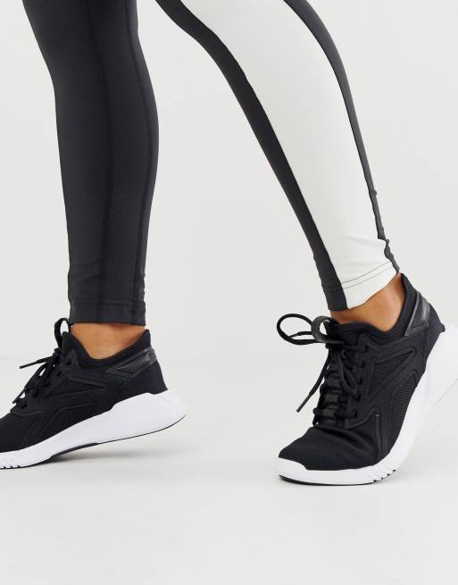 Tigre Camarada Inhalar Reebok Training Freestyle Motion sneakers in black | ASOS