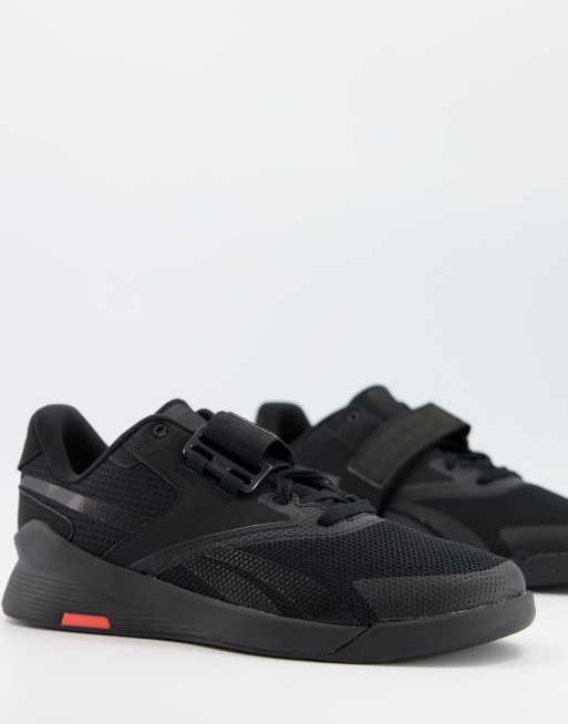 reebok classic legacy az trainers in triple black