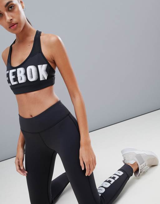 Reebok Racerback Bra Top With Oversized Logo at asos.com