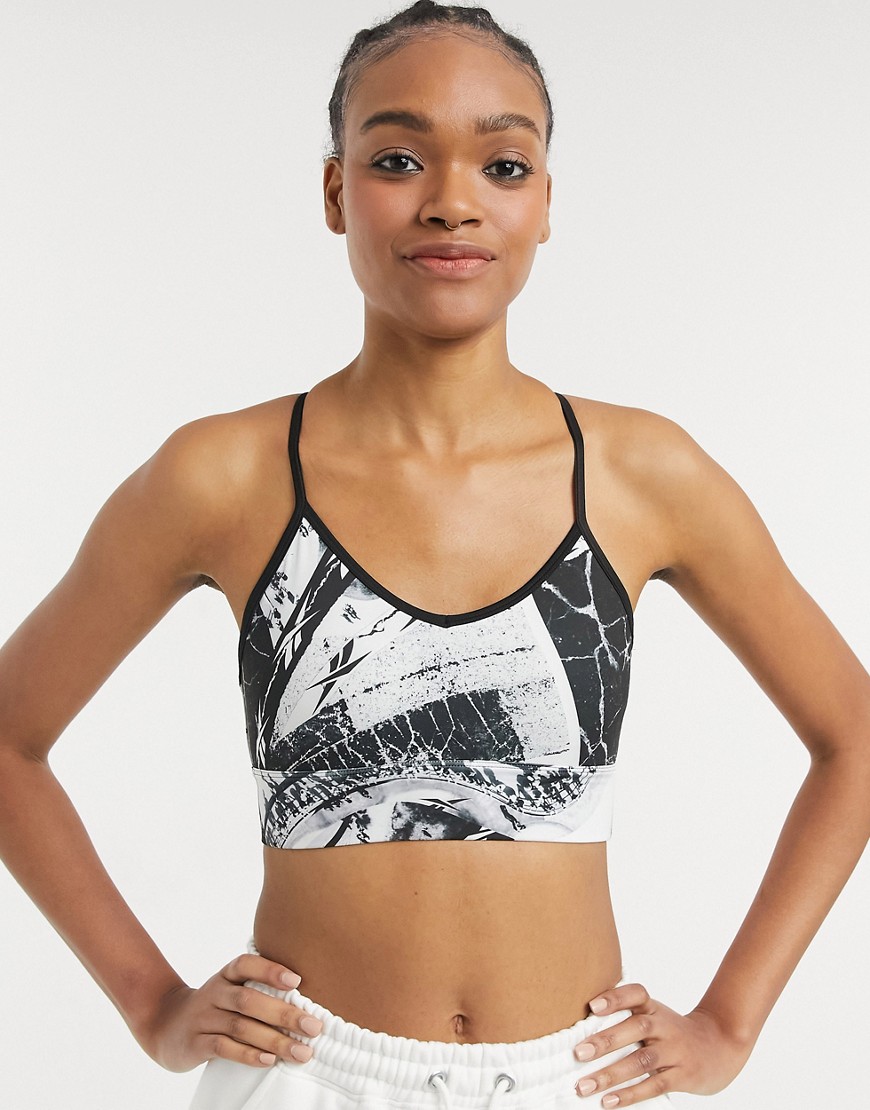 Reebok Training Light Support Printed Sports Bra In Black And White