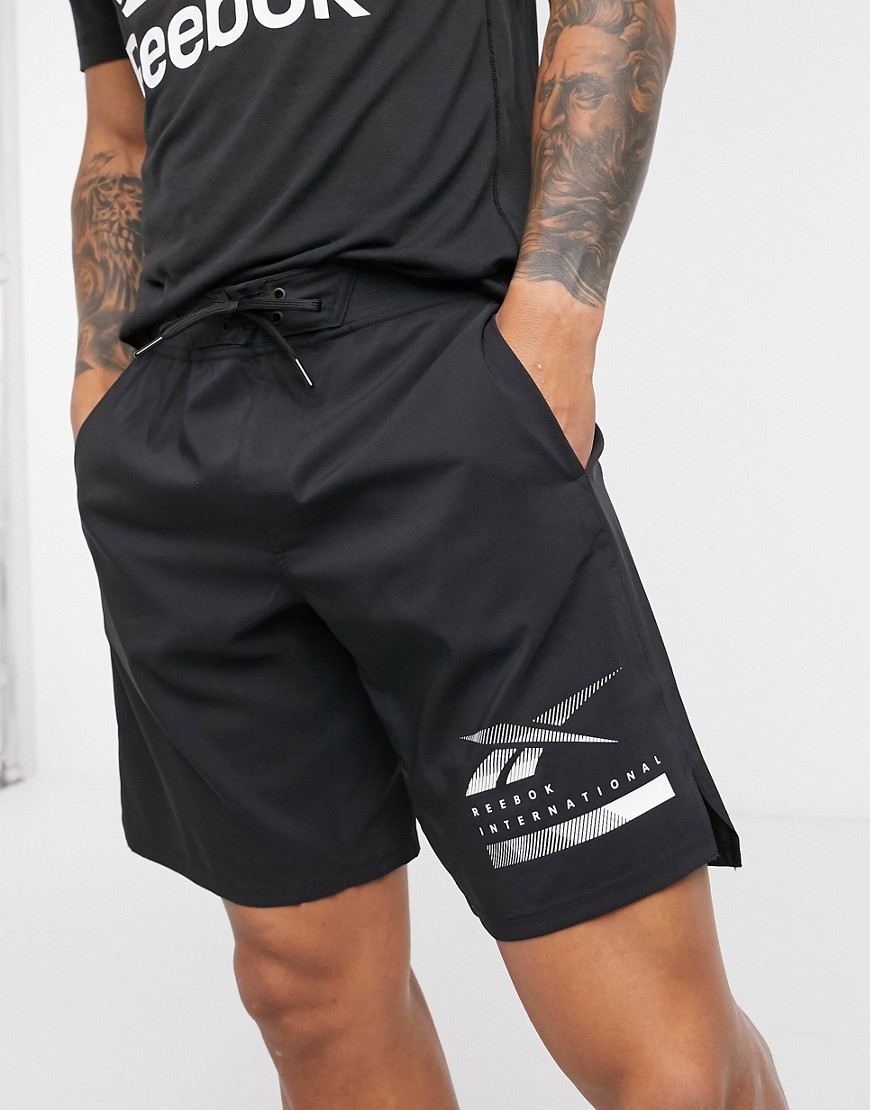 Reebok Training shorts in black with reflective logo