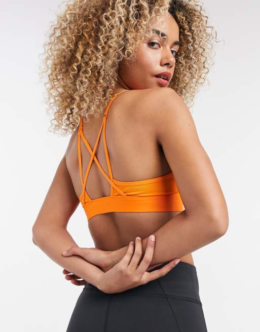 Reebok Training strappy bra in orange ASOS