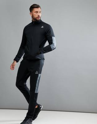 Reebok Training tech tracksuit in black 