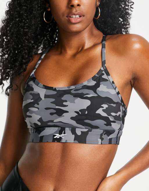 Reebok Training Techstyle camo mid-support sports bra in black ASOS
