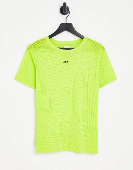 Reebok - Training Techstyle - T-shirt gialla con stampa burnout