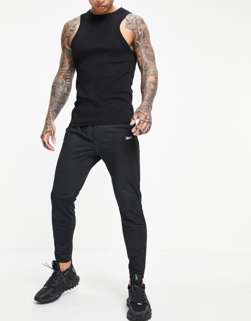 Reebok store tapered pants