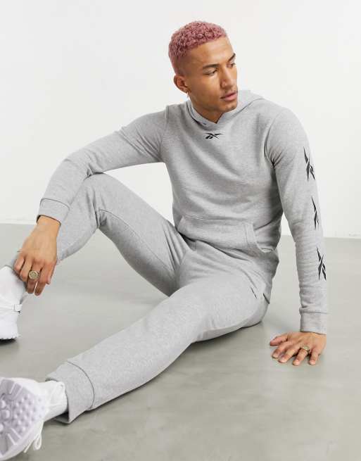 Tuta store reebok grigia