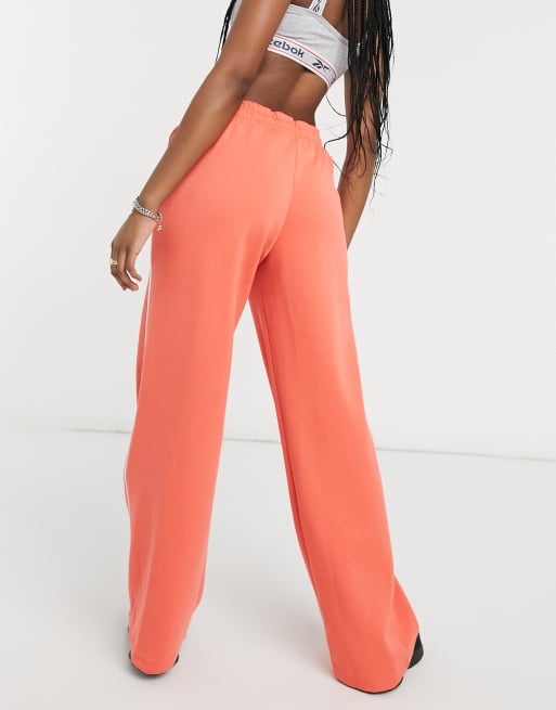 Reebok Training wide leg knit joggers in orange