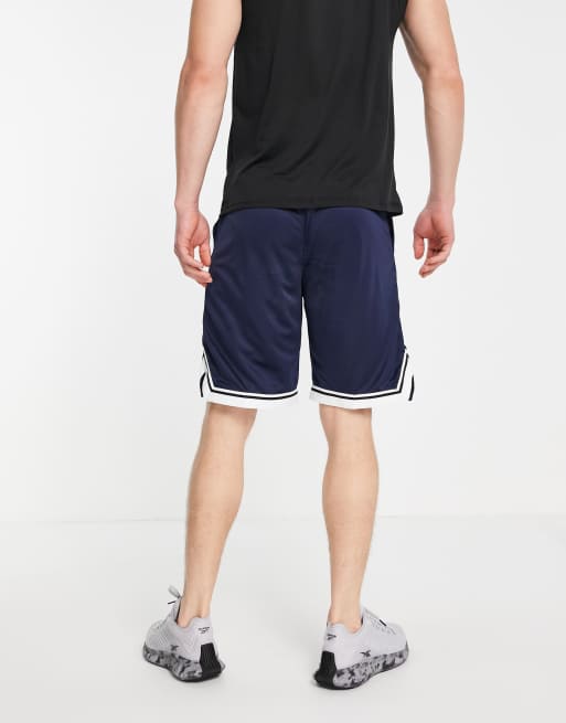 Reebok shop long shorts