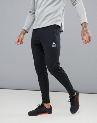 Reebok Training Work Out Ready Trackster Tapered Joggers In Black CW5031 |  ASOS
