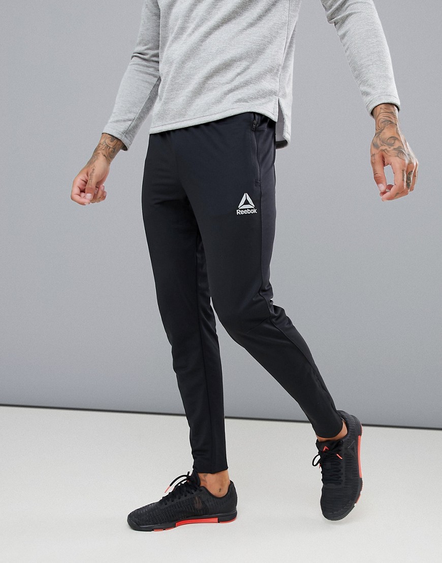 Reebok Training Work Out Ready Trackster Tapered Joggers In Black CW5031
