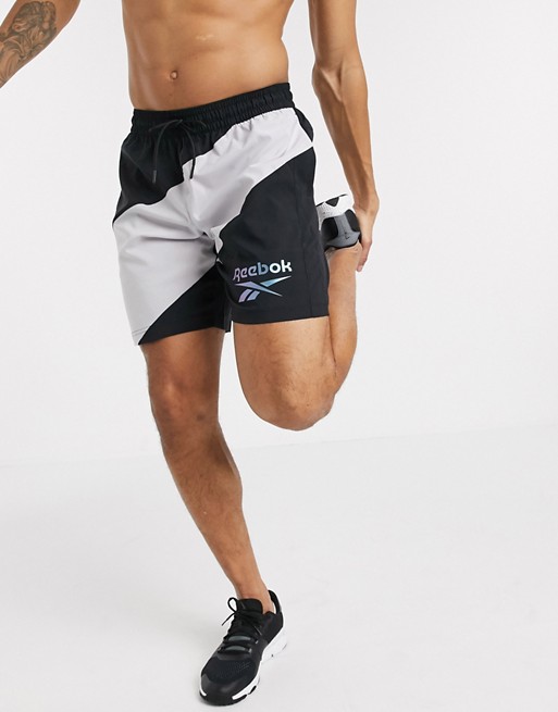 Reebok Training woven shorts with reflective logo in black