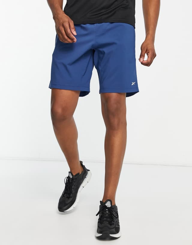 Reebok Training woven tech shorts in blue