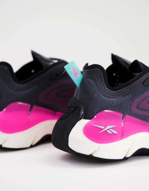 Reebok black store and pink trainers