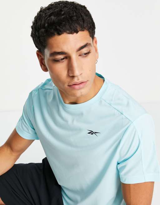 Reebok United by Fitness perforated t-shirt in blue