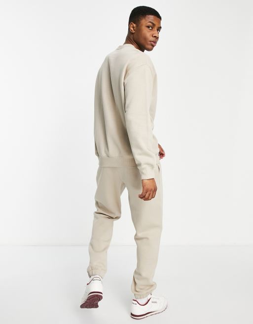 Pull reebok homme beige online