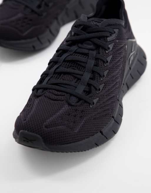 Reebok Zig Kinetic sneakers in black ASOS